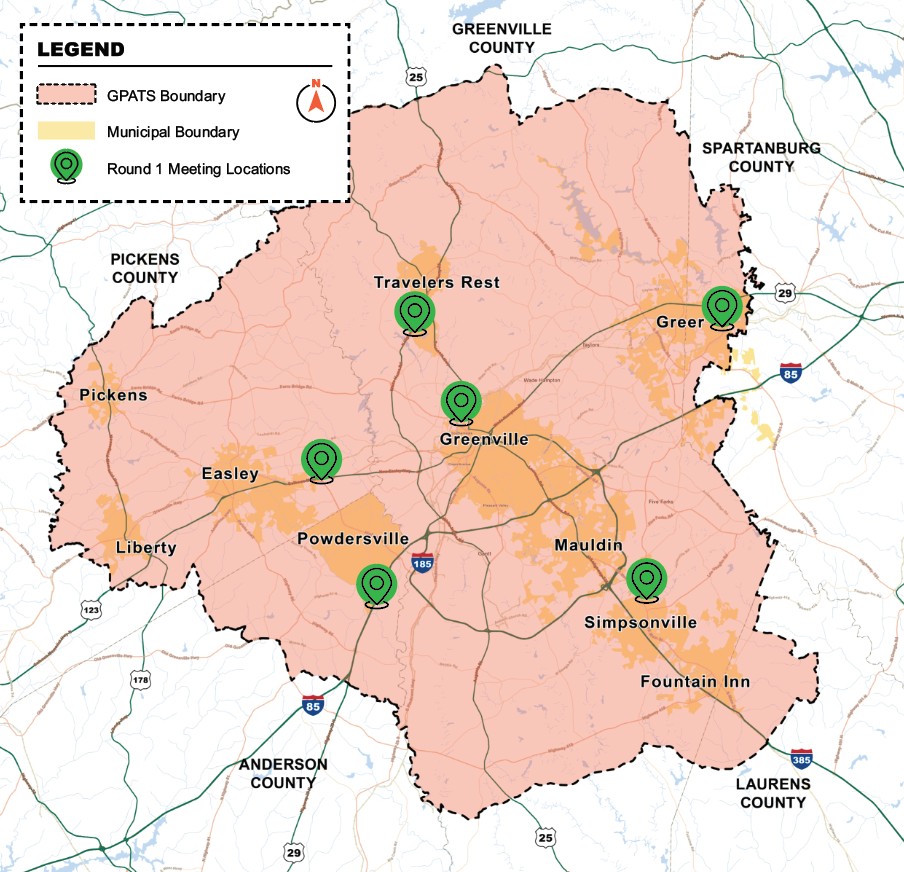 
												Map of the Greenville-Pickens Area Transportation Study (GPATS) region in South Carolina showing the study boundary and Round 1 public meeting locations. The GPATS boundary is shaded light pink with a dashed black outline, and municipal boundaries are highlighted in light yellow. Green location markers identify six Round 1 meeting sites near Travelers Rest, Greenville, Greer, Easley, Powdersville, and Simpsonville. Surrounding counties—Pickens, Anderson, Greenville, Spartanburg, and Laurens—are labeled, along with major communities and highways including I-85, I-185, I-385, U.S. 25, and U.S. 29. A legend identifies the GPATS boundary, municipal boundaries, Round 1 meeting locations, and includes a north arrow.
												